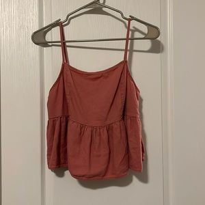 La hearts, pink top with open back. Perfect for a new spring wardrobe.